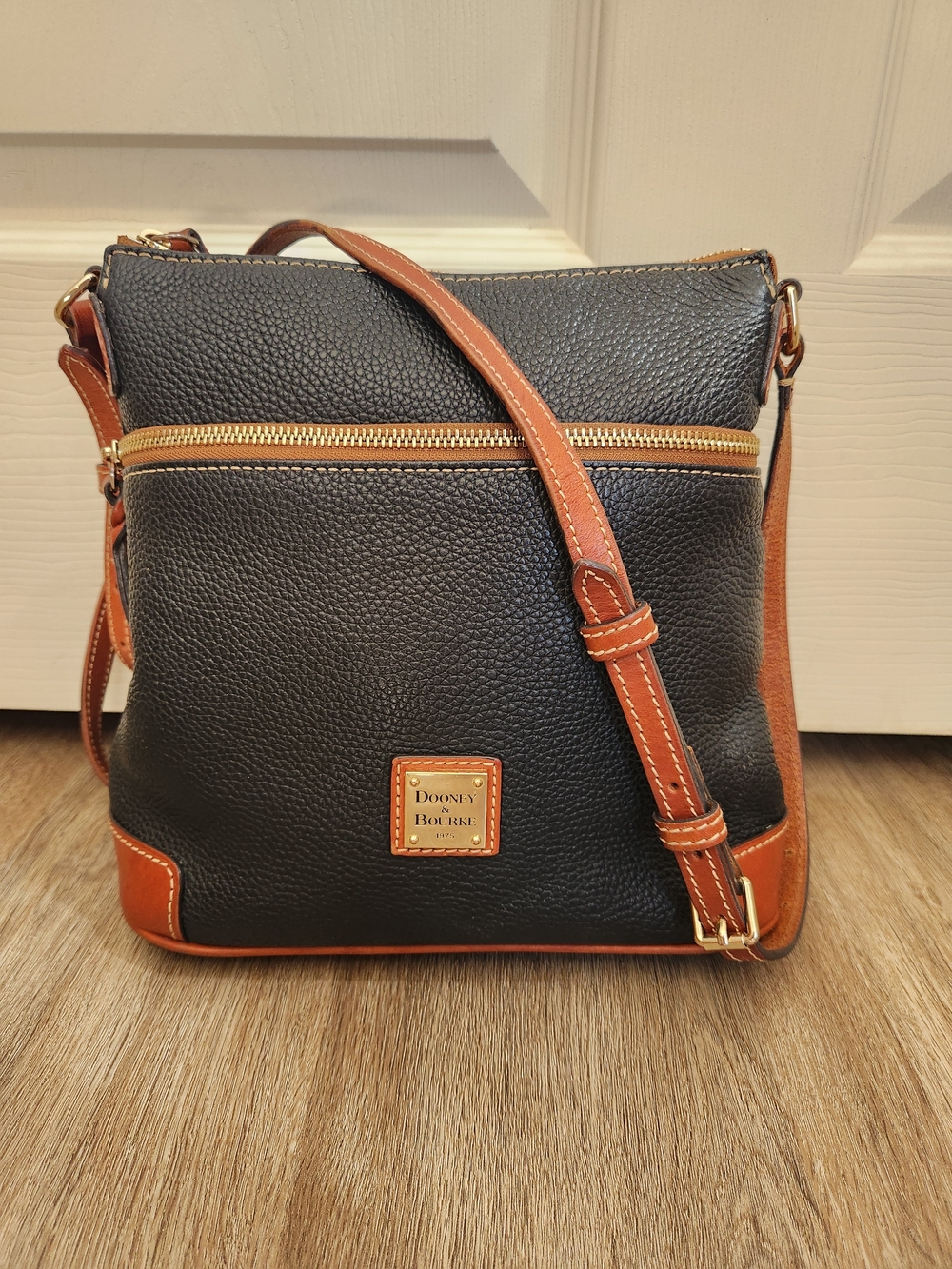 Dooney & Bourke Black Pebbled Leather Crossbody with Brown Trim